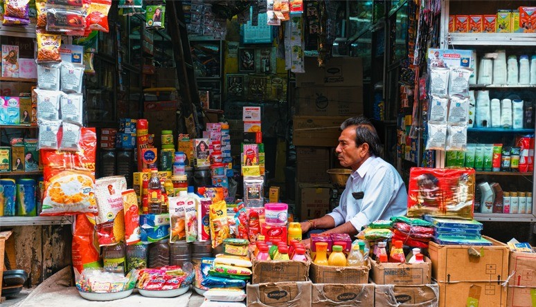 Retail shop showcasing FMCG and personal care products in a rural market — representing Vxceed’s transformation of rural distribution operations.